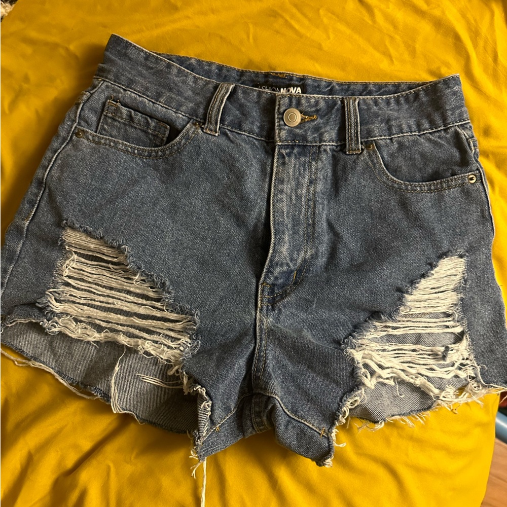 Brand new distressed denim shorts